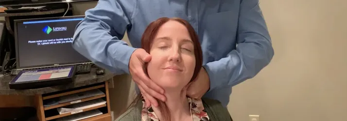 Chiropractor Frederick MD Sebastian Lipinski Adjusting A Vertigo Patient