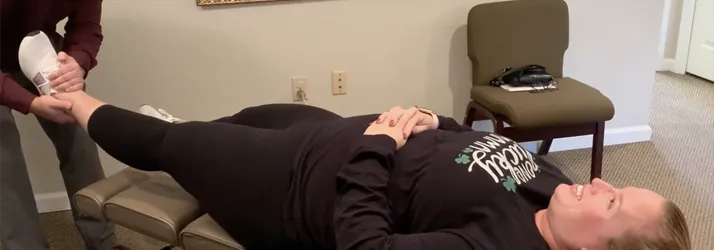 Chiropractor Frederick MD Sebastian Lipinski Adjusting Arm & Leg Pain Patient Chiropractor Frederick MD Sebastian Lipinski Adjusting Arm & Leg Pain Patient