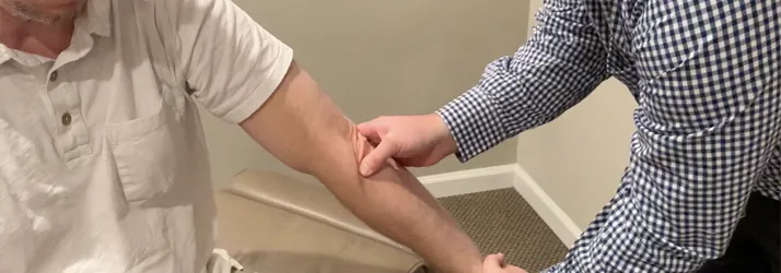 Chiropractor Frederick MD Sebastian Lipinski With Sport Injury Patient Chiropractor Frederick MD Sebastian Lipinski With Sport Injury Patient
