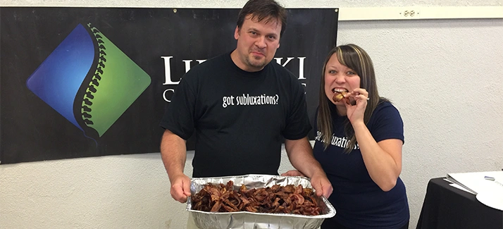 Chiropractor Sebastian Lipinski With Tray Of Bacon